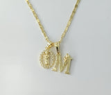 Gold plated dainty letter M pendant on a solid chain necklace.

Solid gold chain Saint Jude pendant necklace with letter