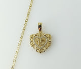 A dainty heart shaped necklace on a gold plated star chain and 2.5mm quince chain.