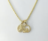 Gold plated Virgin Mary double pendants on 2mm rope braided chain necklace

Gold plated double pendants with Virgin Mary