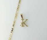 Gold plated figaro chain necklace with dainty letter "K" pendant.
Gold plated dainty letter "K" pendant on figaro chain