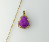 A delicate 14K gold-plated chain necklace with a Buddha pendant in a twist design.

A gold-plated Buddha pendant adorns