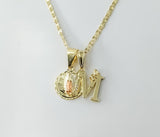 Golden plated sterling silver star chain necklace with Virgin Mary pendants.

Double dainty pendants with a Virgin Mary