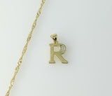 Gold plated 14K twist chain necklace with small letter "R" pendant.

Gold plated 14K chain necklace featuring small engr