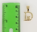 Delicate gold plated pendant of a Virgin Mary with anchor symbol.
Virgin Mary figure adorns a gold plated pendant with a