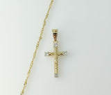 A 14K gold plated twist chain necklace with a small cross pendant.

A gold plated twist chain necklace features a small