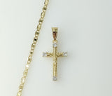 Gold plated small cross pendant on a flat mariner anchor chain necklace.

Gold plated anchor chain with a small cross pe
