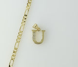 A 3mm figaro chain necklace with a dainty plated letter "U" pendant.

A dainty plated necklace featuring a small figaro